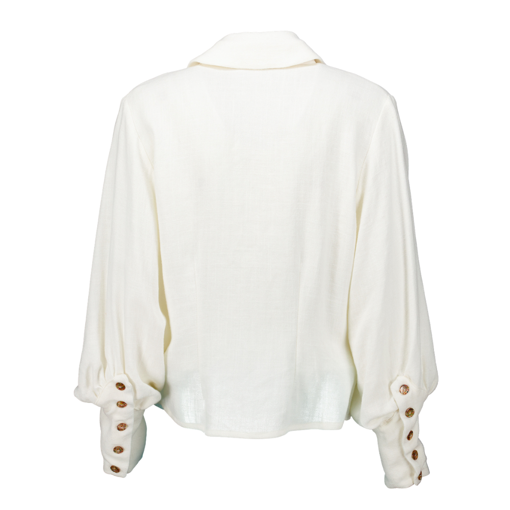 Blusa puños irregulares